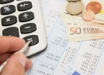 Une calculatrice et un billet de 50 euros